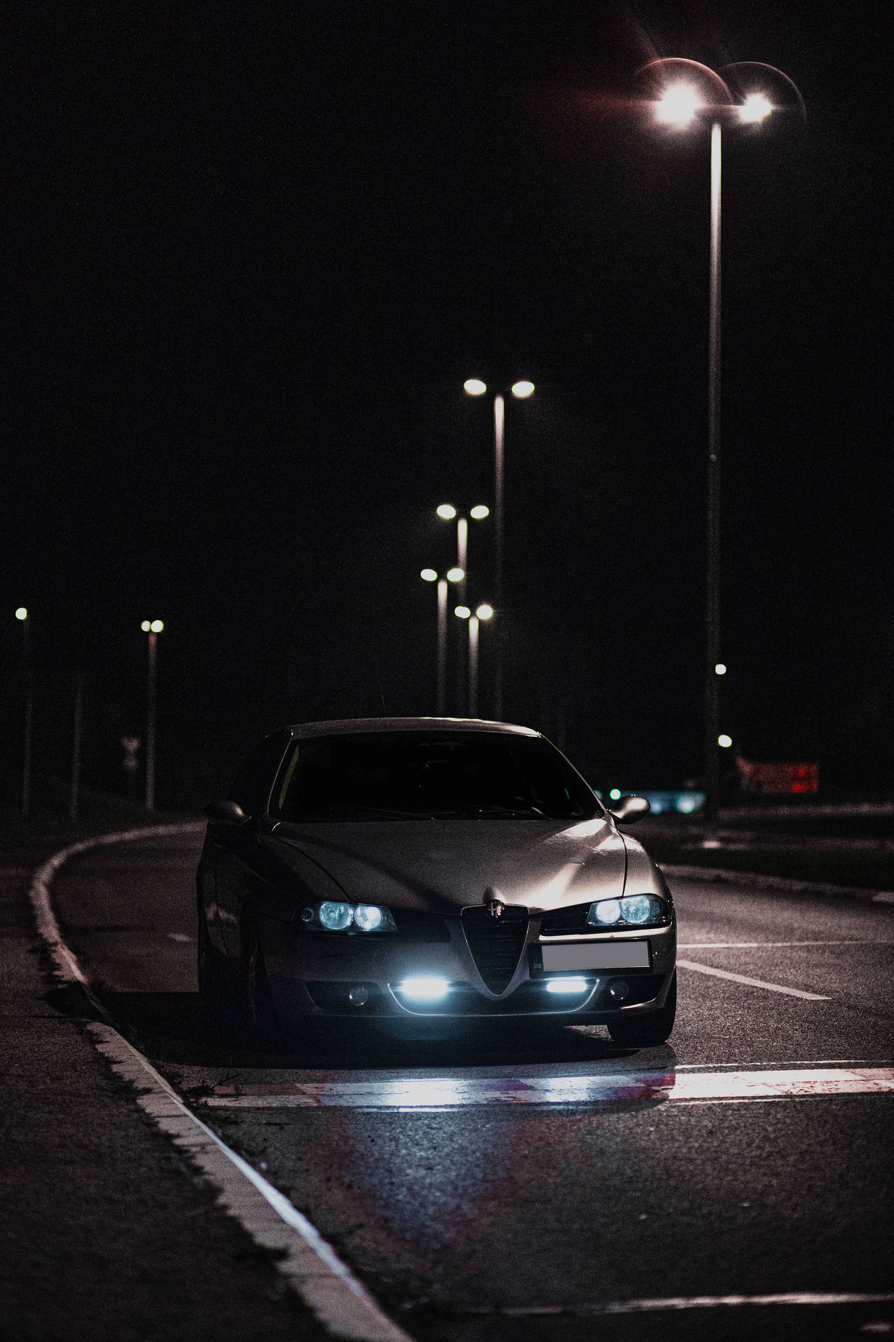 Silver Alfa Romeo At Night
