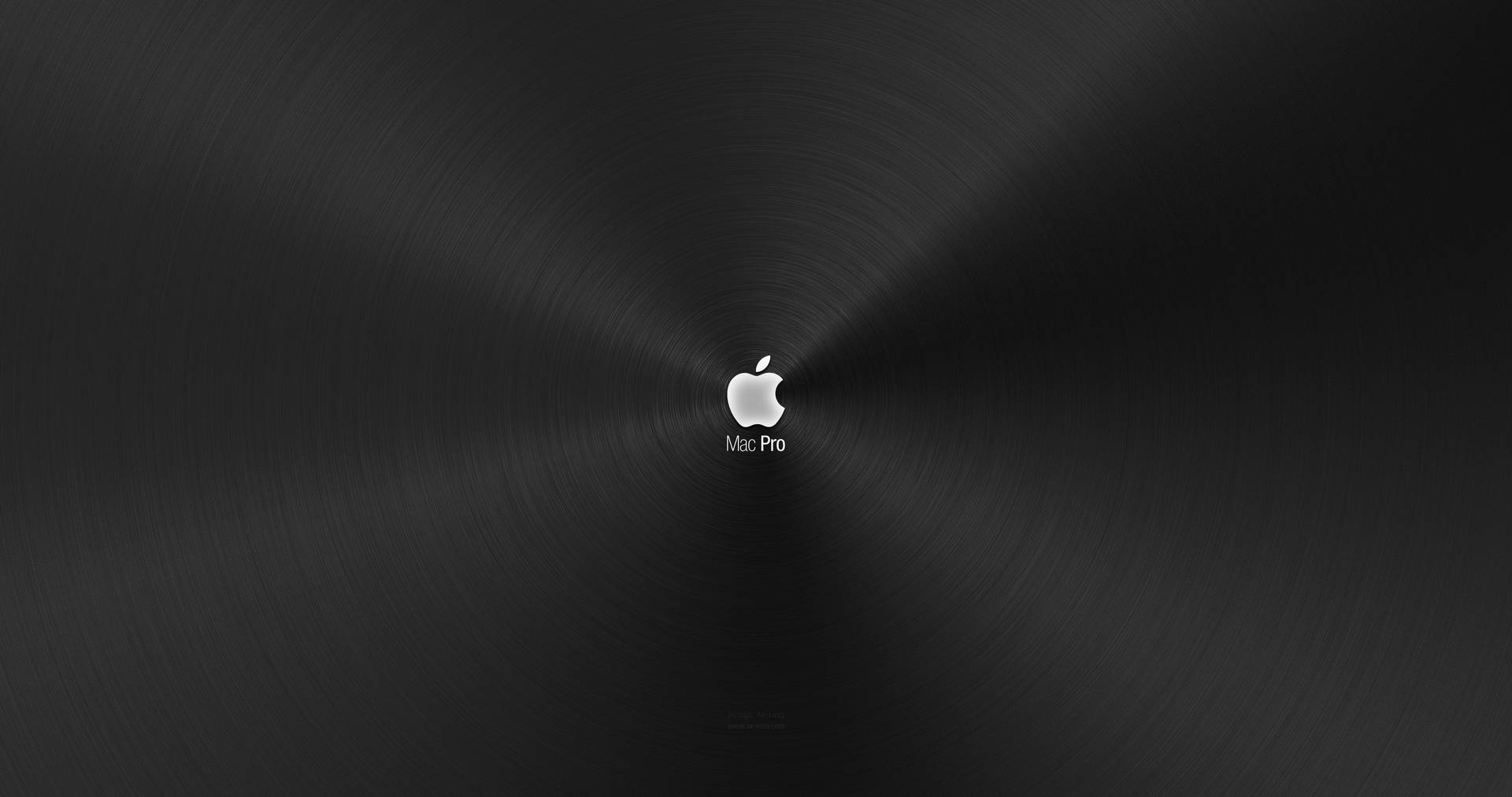 Logode Apple Plateado En Un Macbook Pro En 4k. Fondo de pantalla