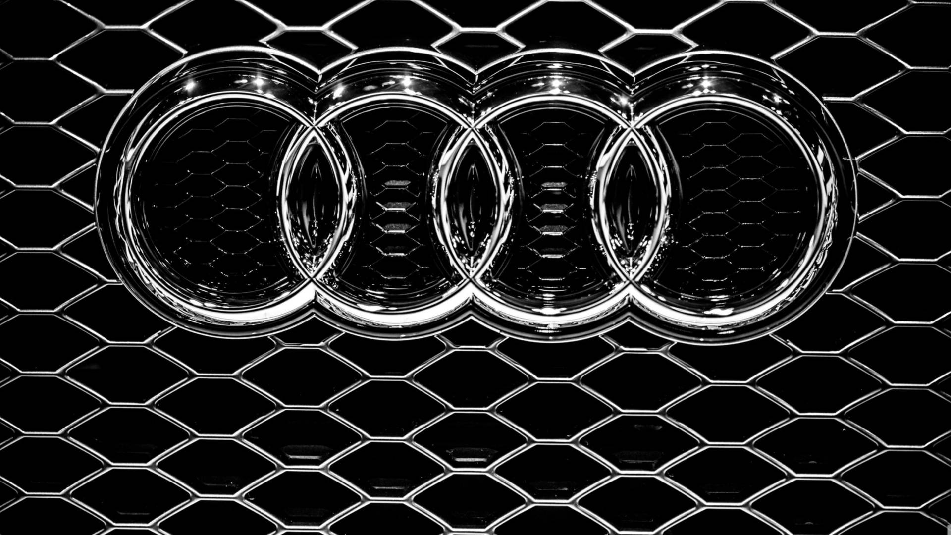 Silver Audi Car Emblem In Solid Black Picture