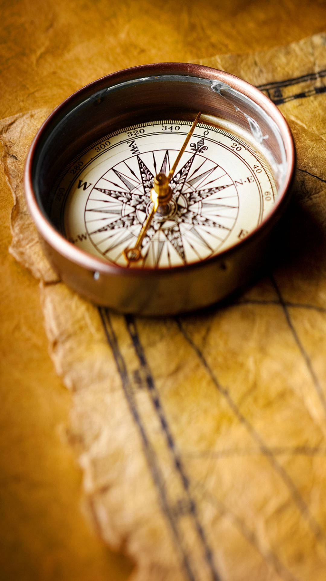 Silver Compass On Ephemeral Paper Background