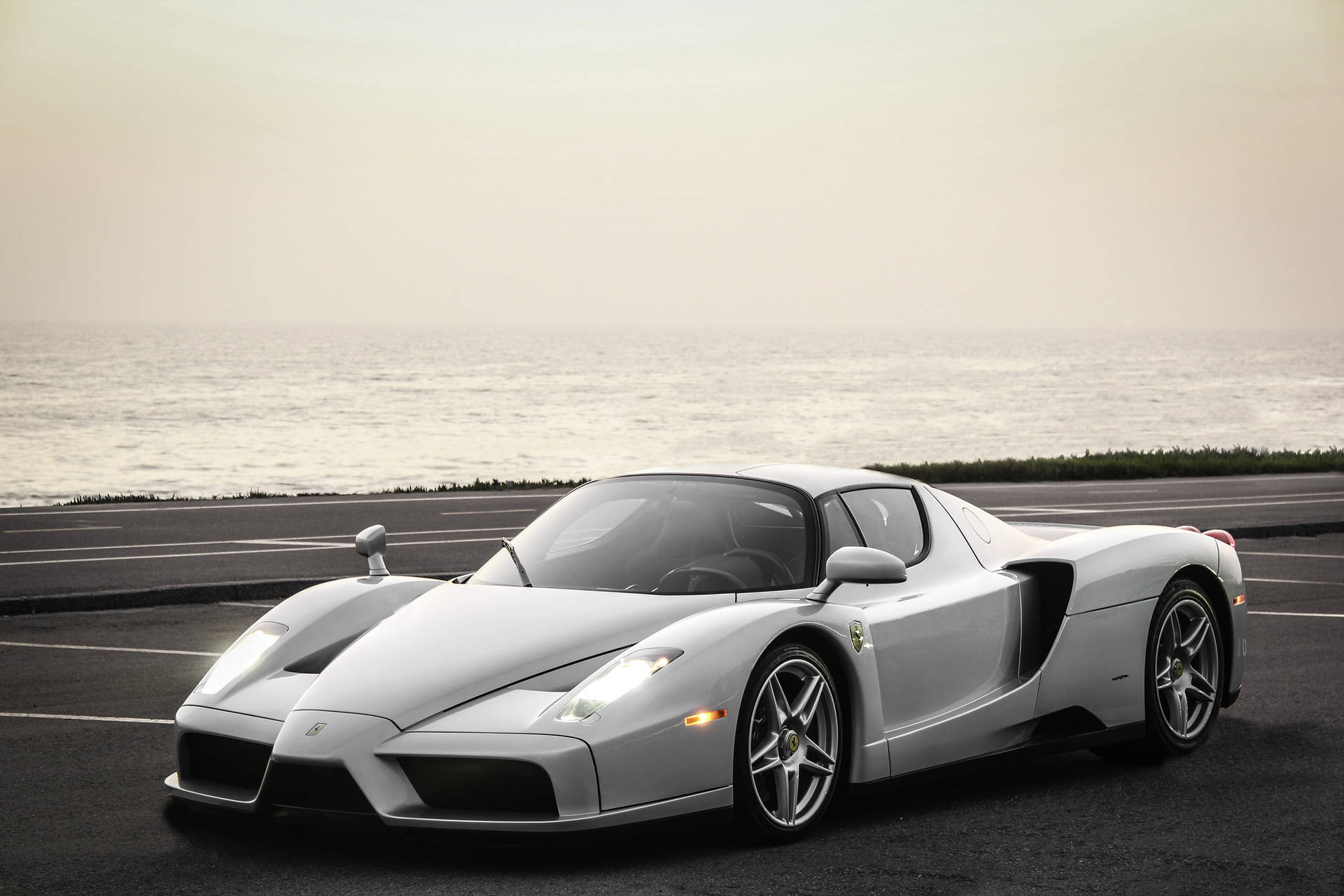 Enjoy the thrill of driving a luxurious Ferrari Wallpaper
