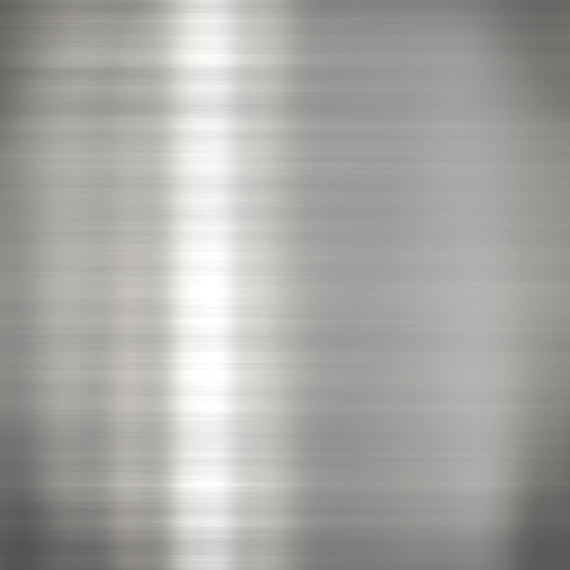 A Silver Metal Plate Background With A Light Reflection