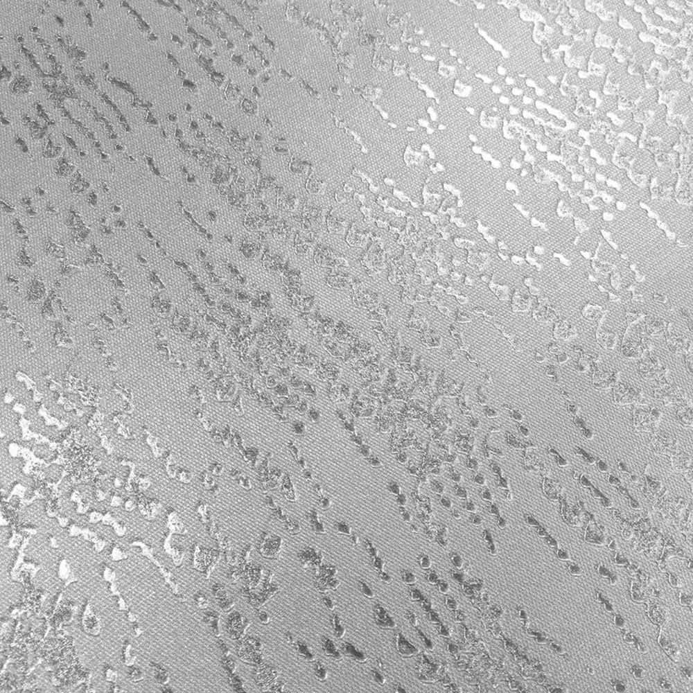A Close Up Of A Silver Surface With A Pattern