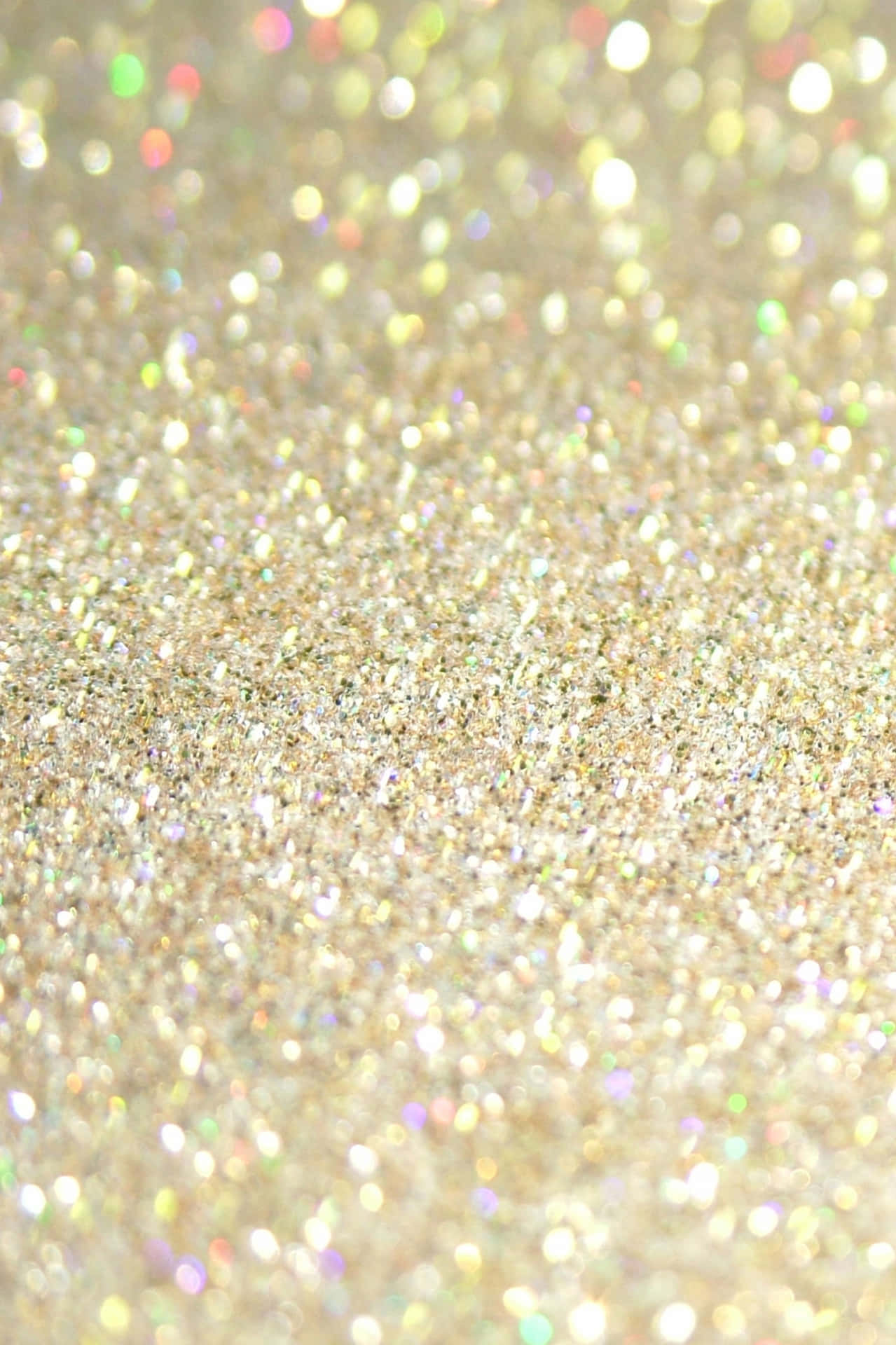 A Close Up Of A Gold Glitter Background