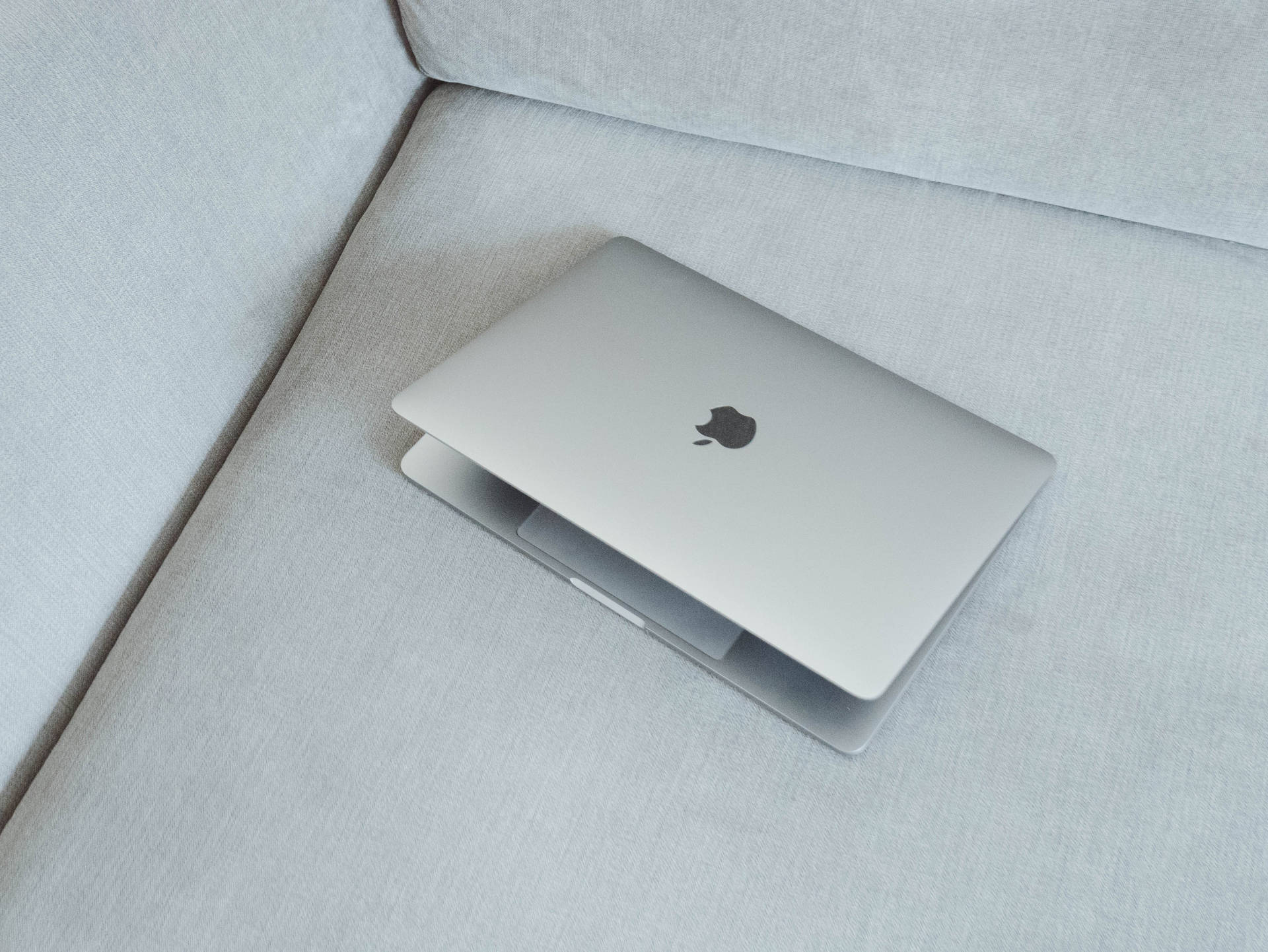Silver MacBook Pro Wallpaper