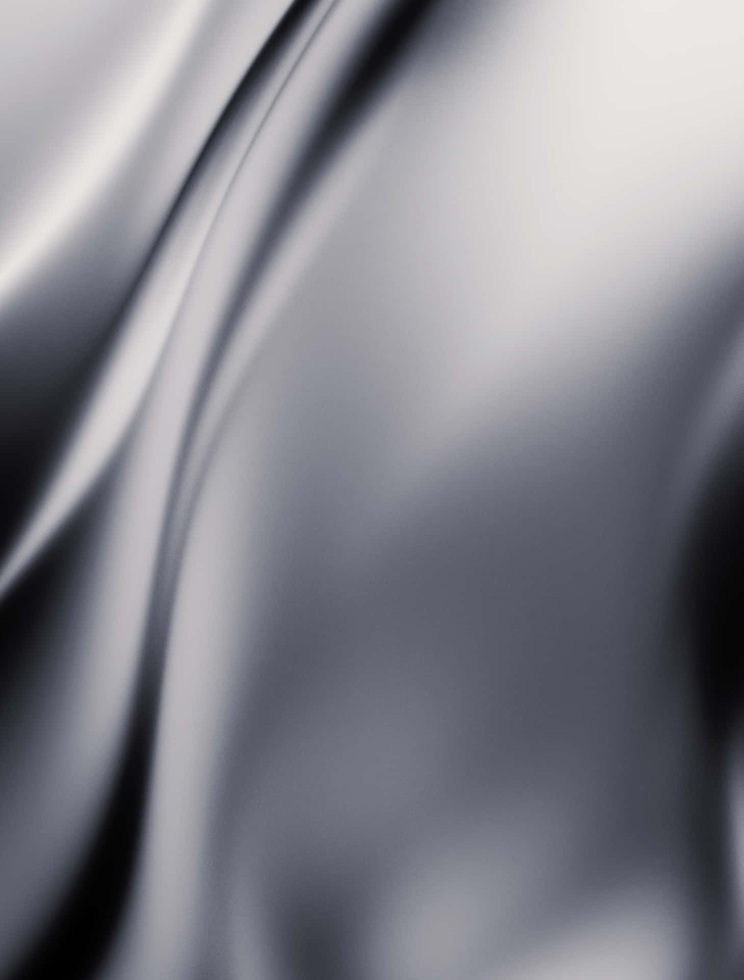 A Close Up Of A Black And Silver Silk Background