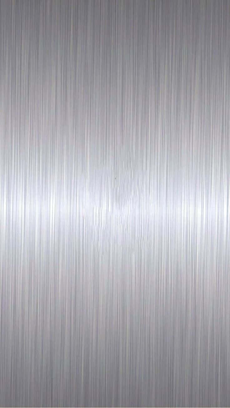 A Silver Metal Background With A Brushed Texture