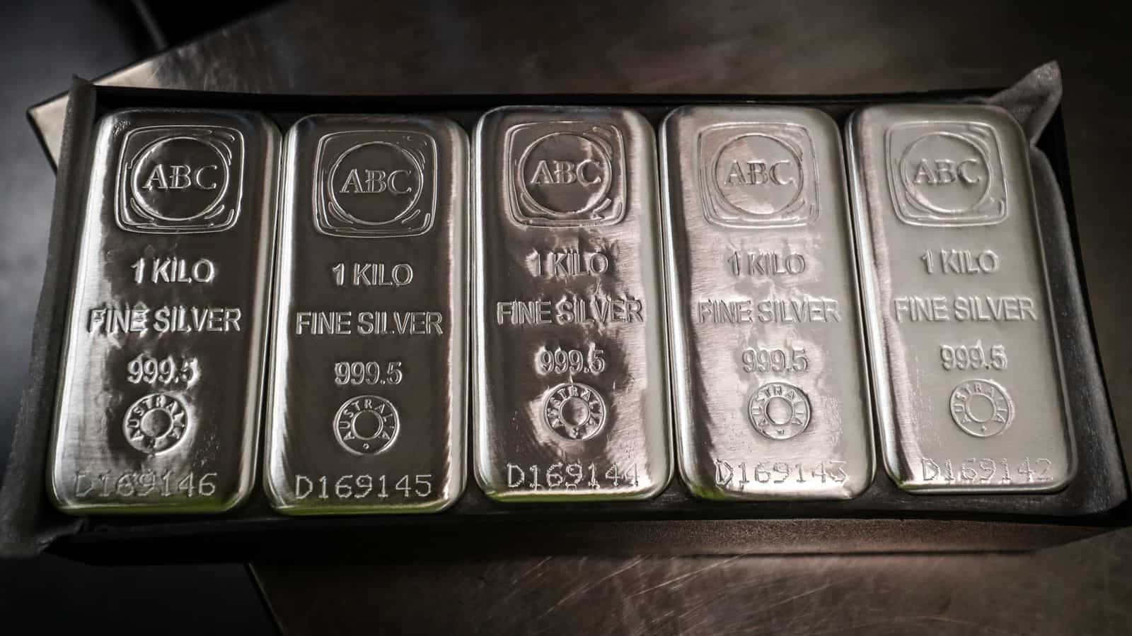 A Box Of Silver Bars Sitting On A Table