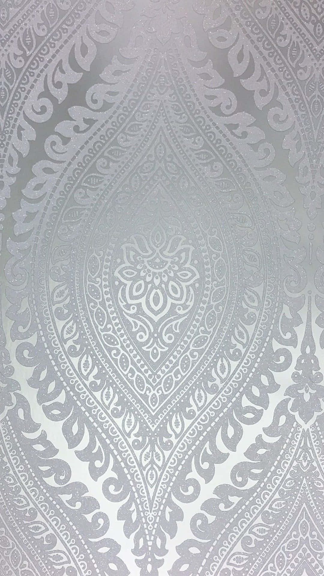 Eineweiße Tapete Mit Einem Silbernen Muster