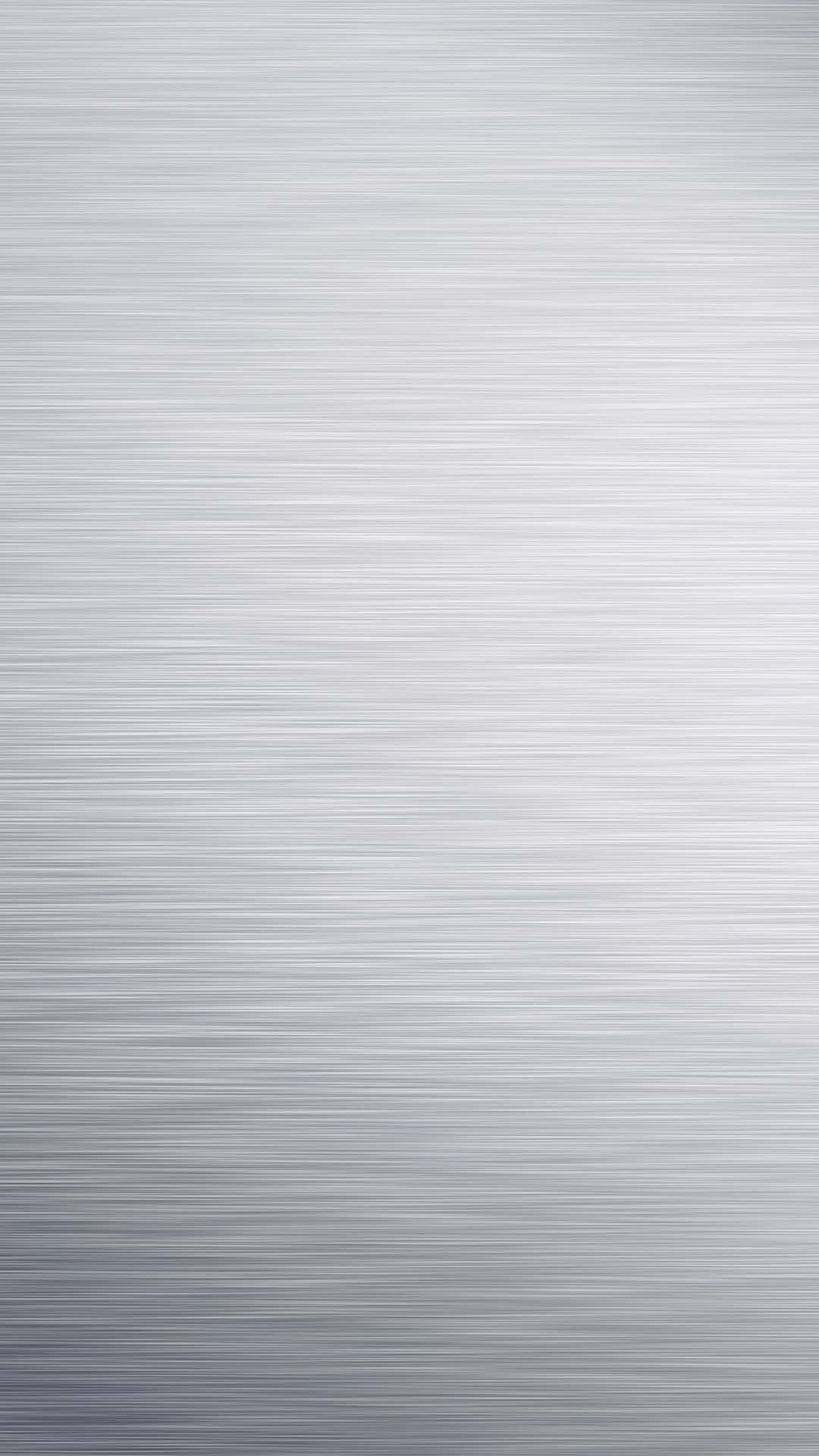 A Silver Metal Plate Background With A Textured Surface