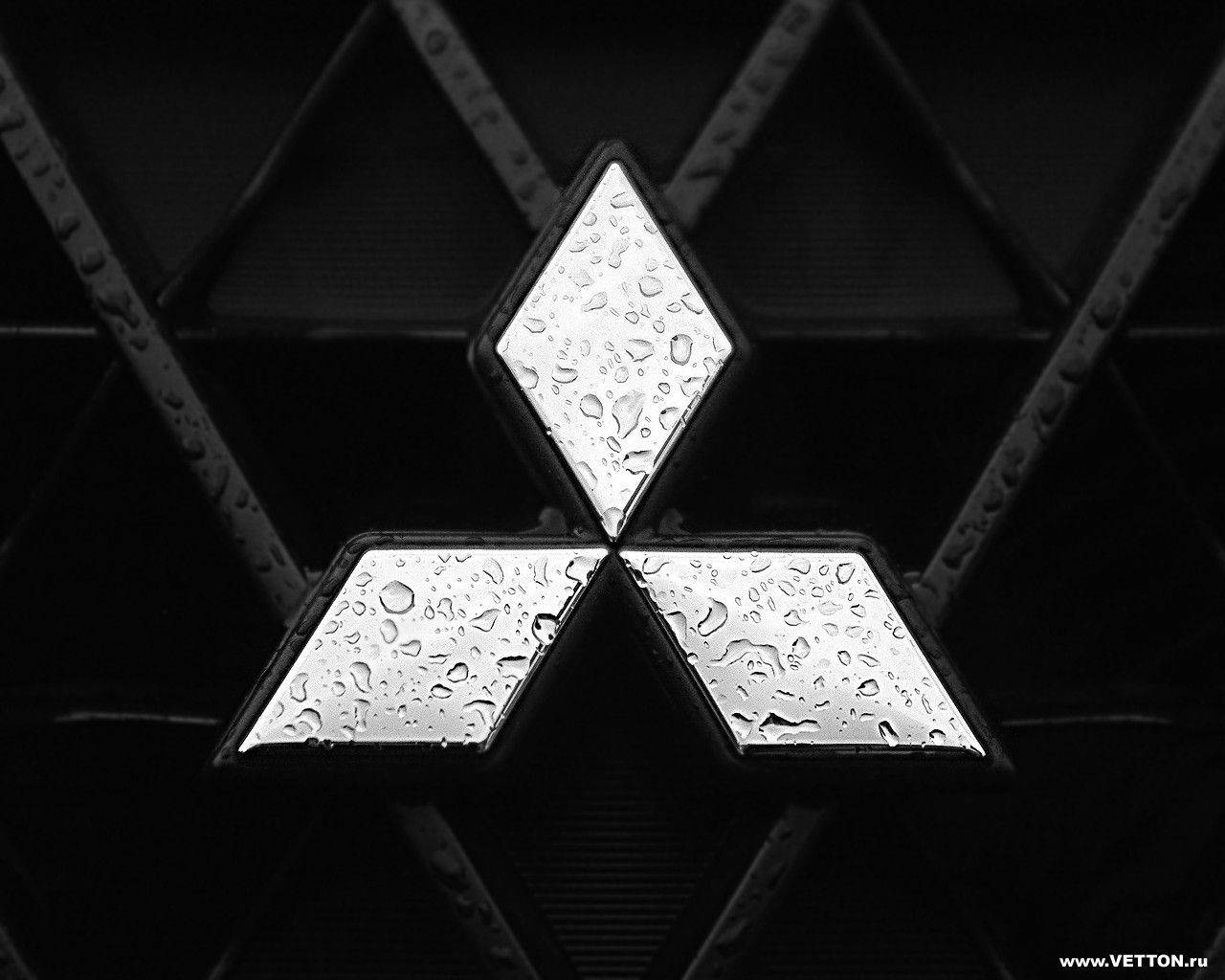 Sølv Skinnende Vådt Mitsubishi-logo Wallpaper