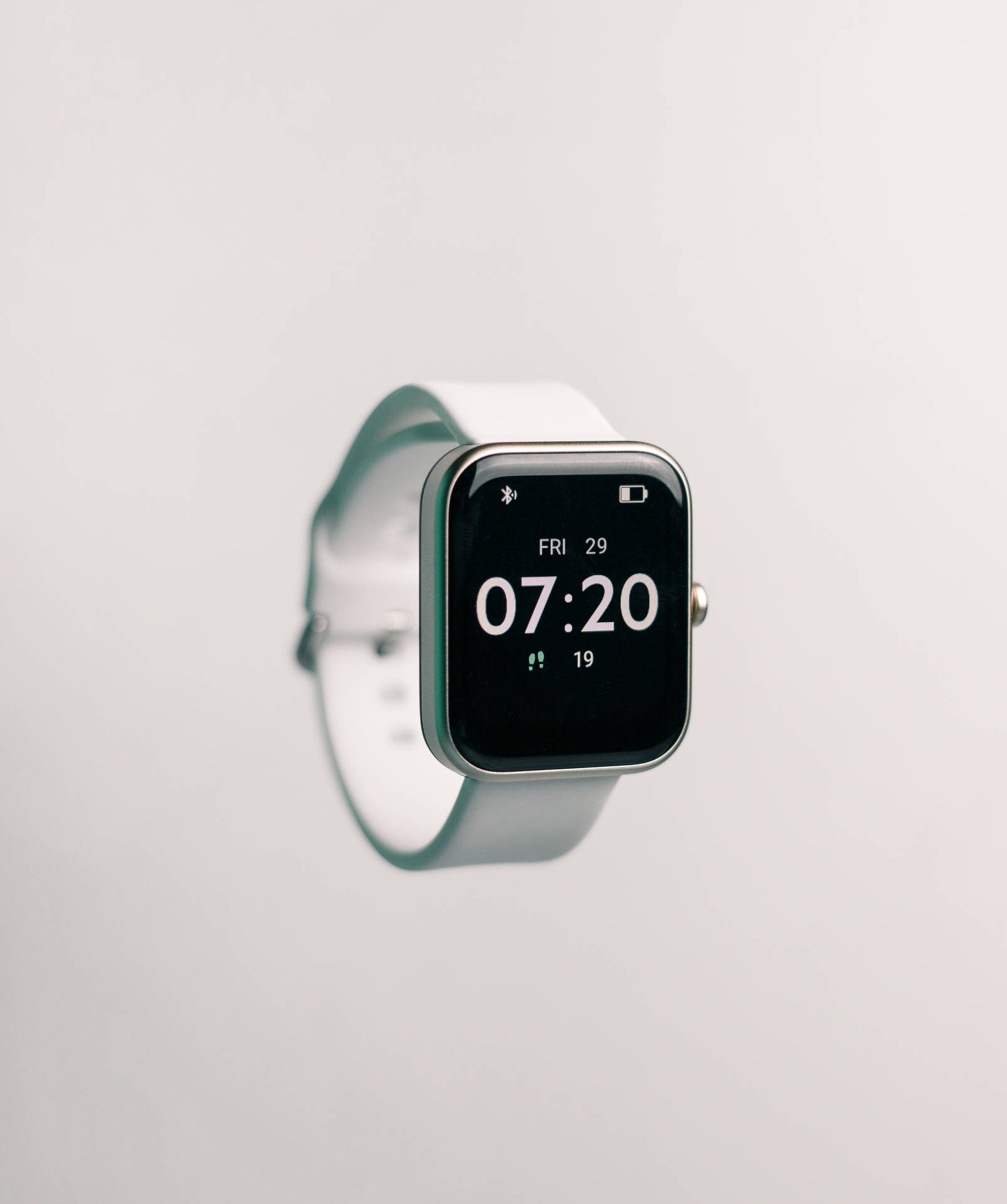 Silver Smartwatch On White Wallpaper