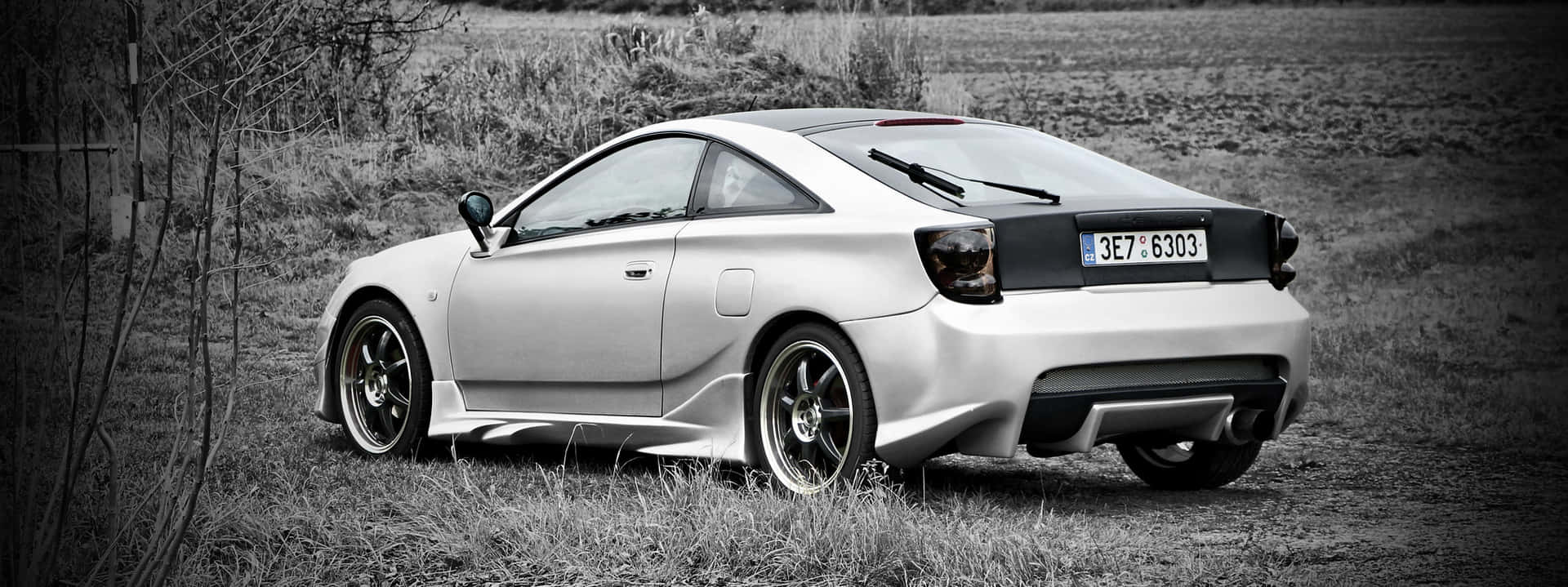 Zilveren Toyota Celica Zijaanzicht Achtergrond