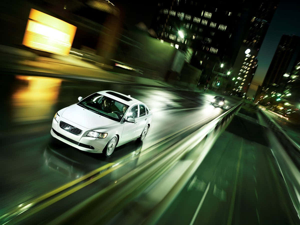 Silver Volvo S40 In A Open Road Wallpaper