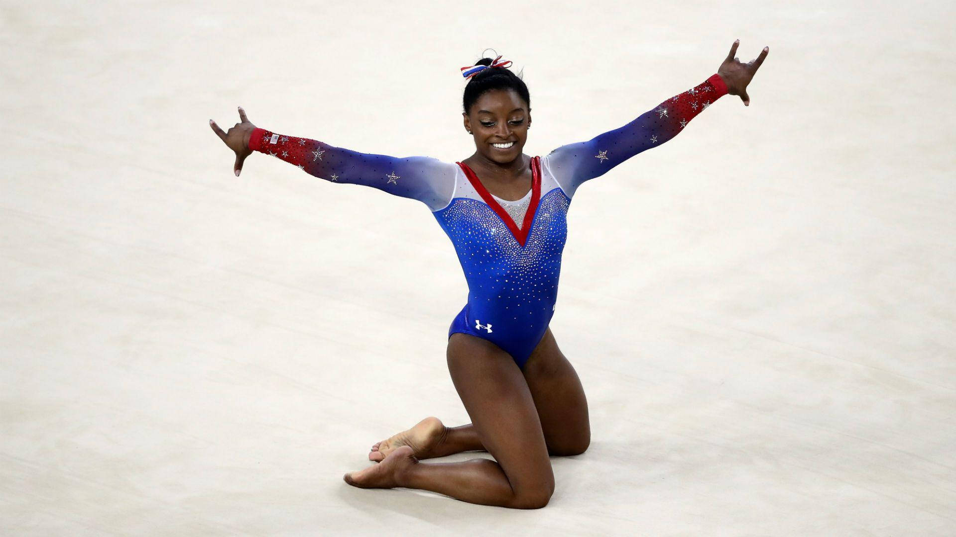 Download 3 Time Olympic Champions Simone Biles Wallpaper