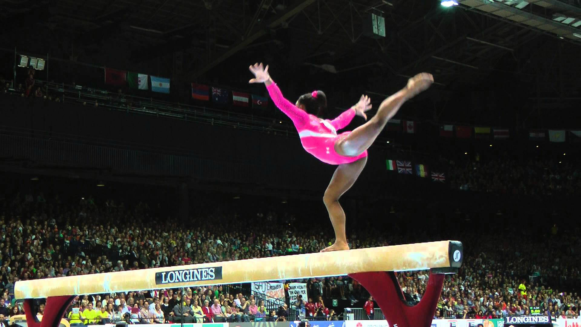 "world Champion Gymnast Simone Biles Flying High" Wallpaper