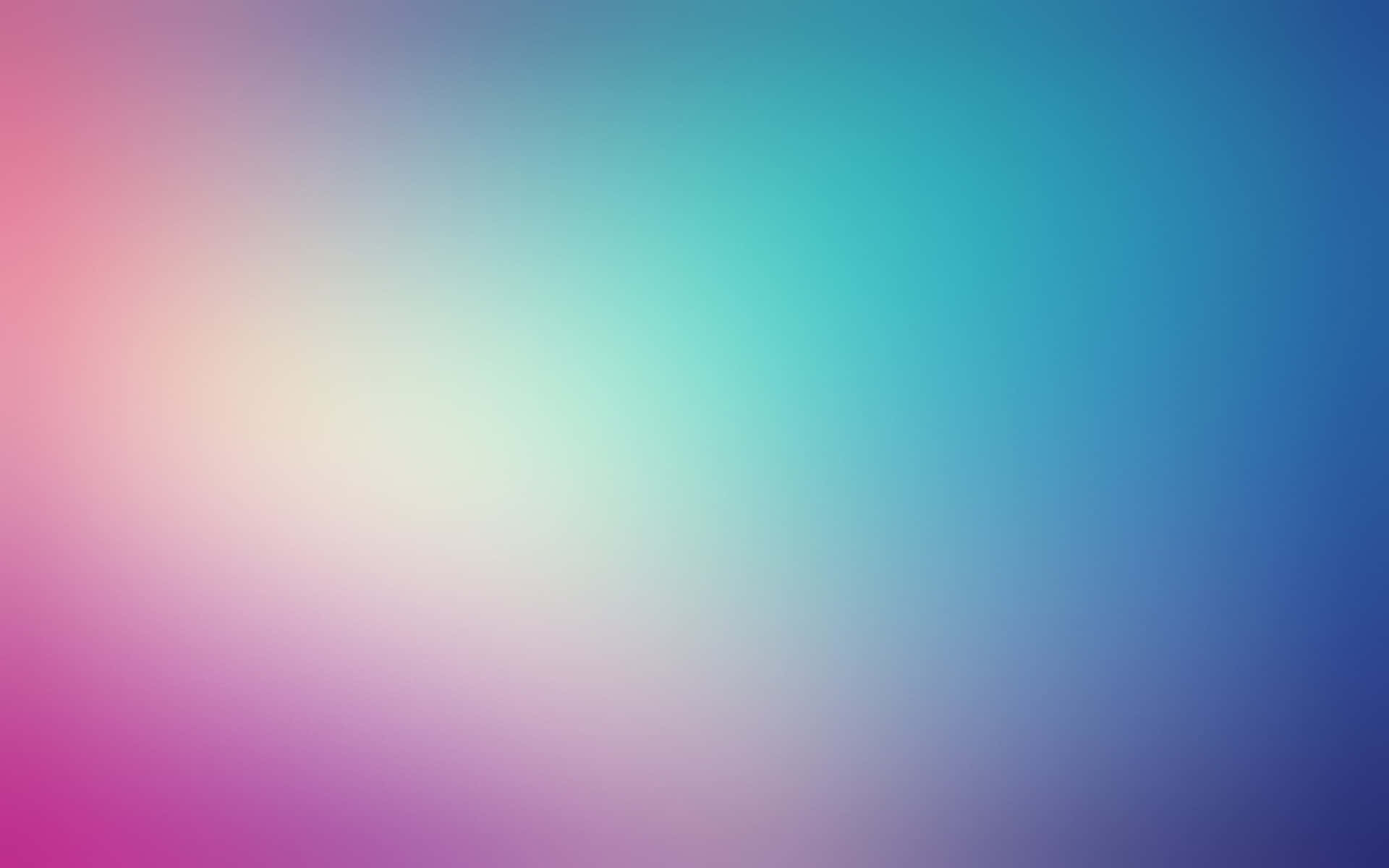 a blurred background with blue and pink colors