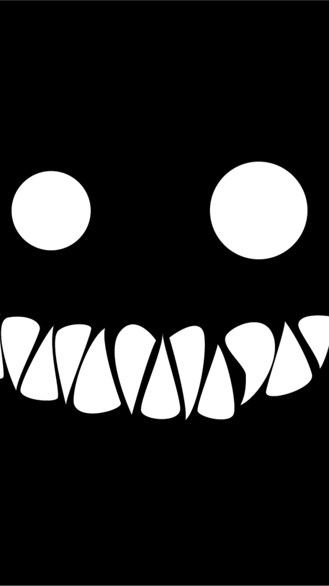 A Black And White Image Of A Scary Face Wallpaper