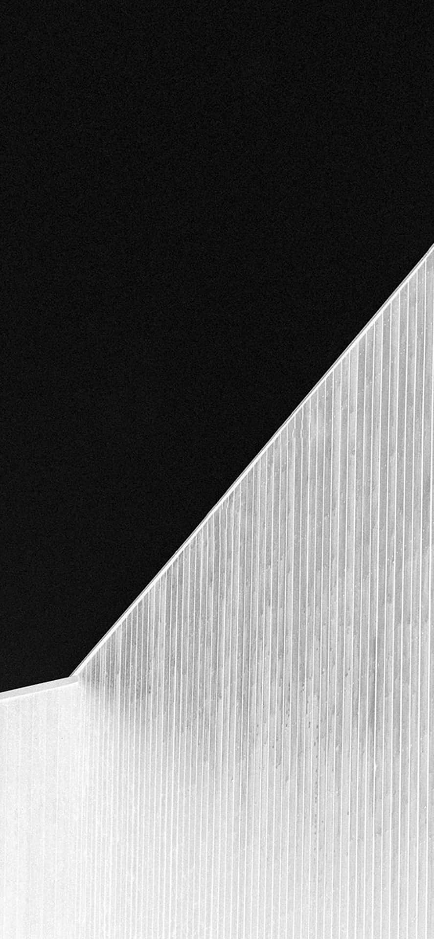 A Black And White Photo Of A Building Wallpaper