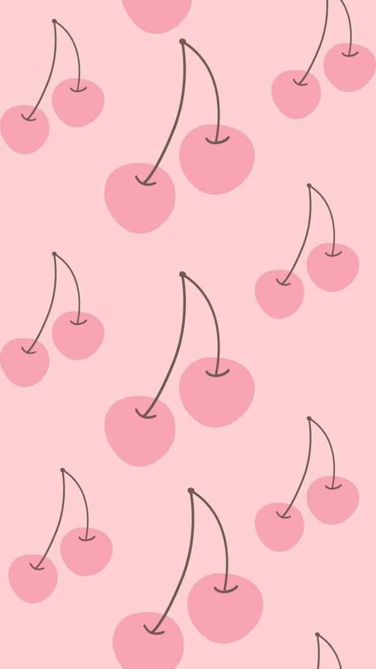 A Pink Background With Cherries On It Wallpaper