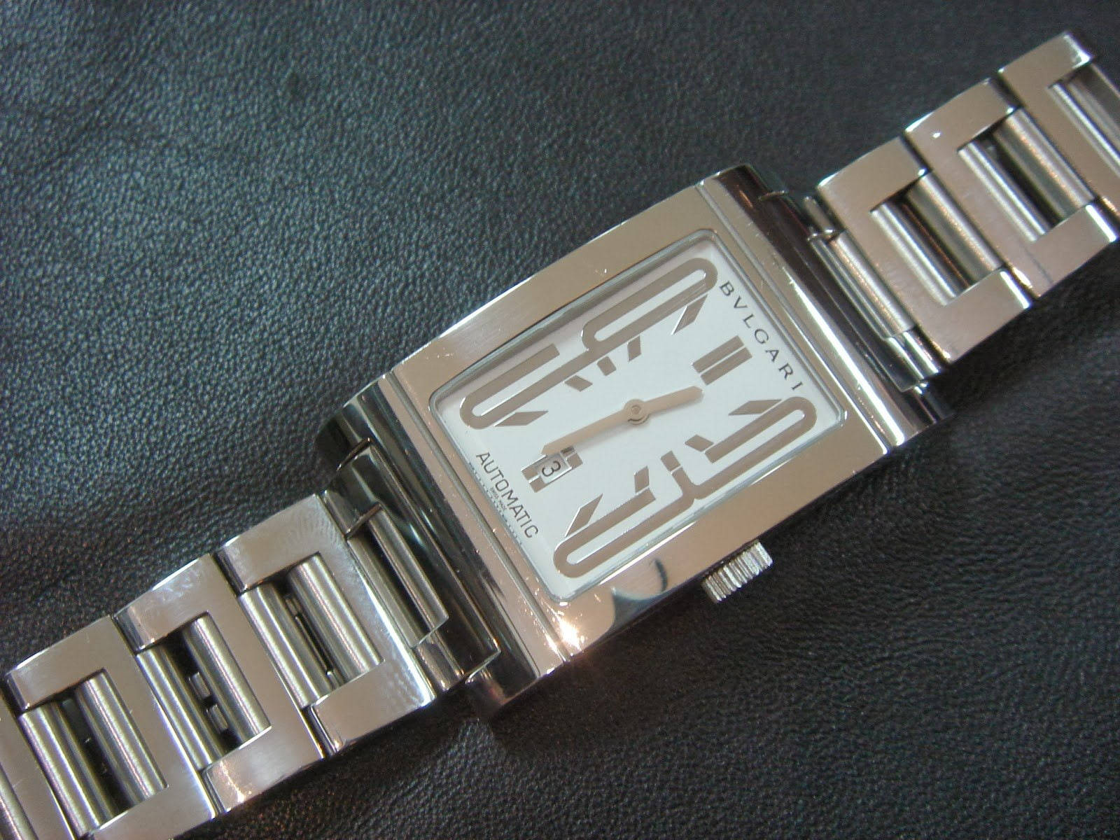 Luxury Simplified: The Bvlgari Silver Watch Wallpaper