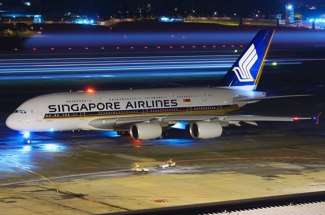 Singapore Airlines Lufthavn nat himmel Tapet Wallpaper