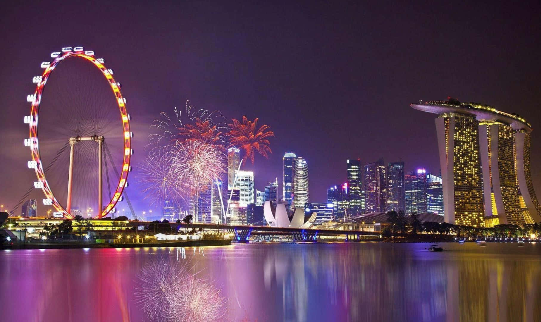 Illuminated at night, the iconic skyline of Singapore