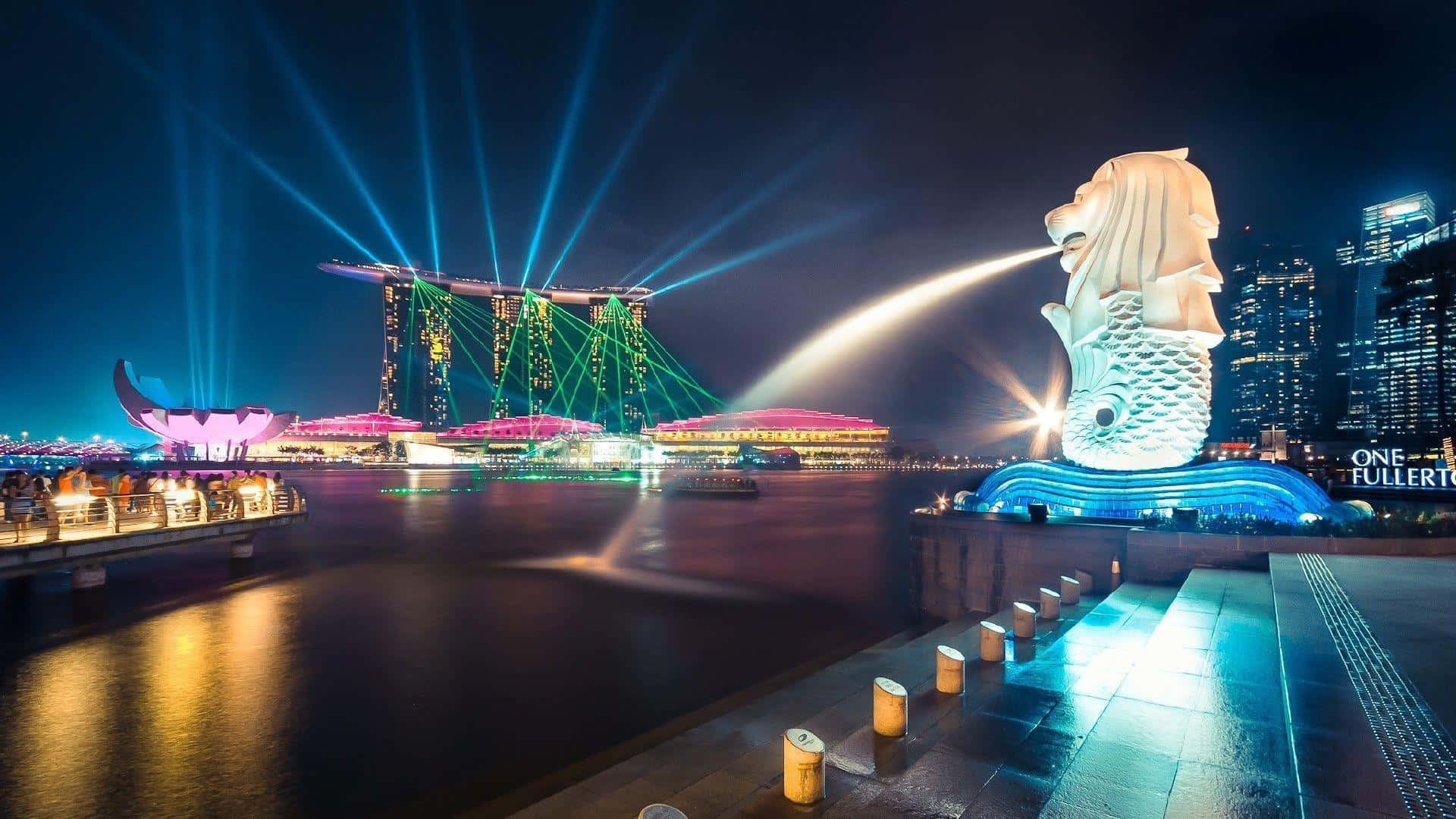 Singapuraà Noite Com Uma Fonte E Luzes Da Cidade