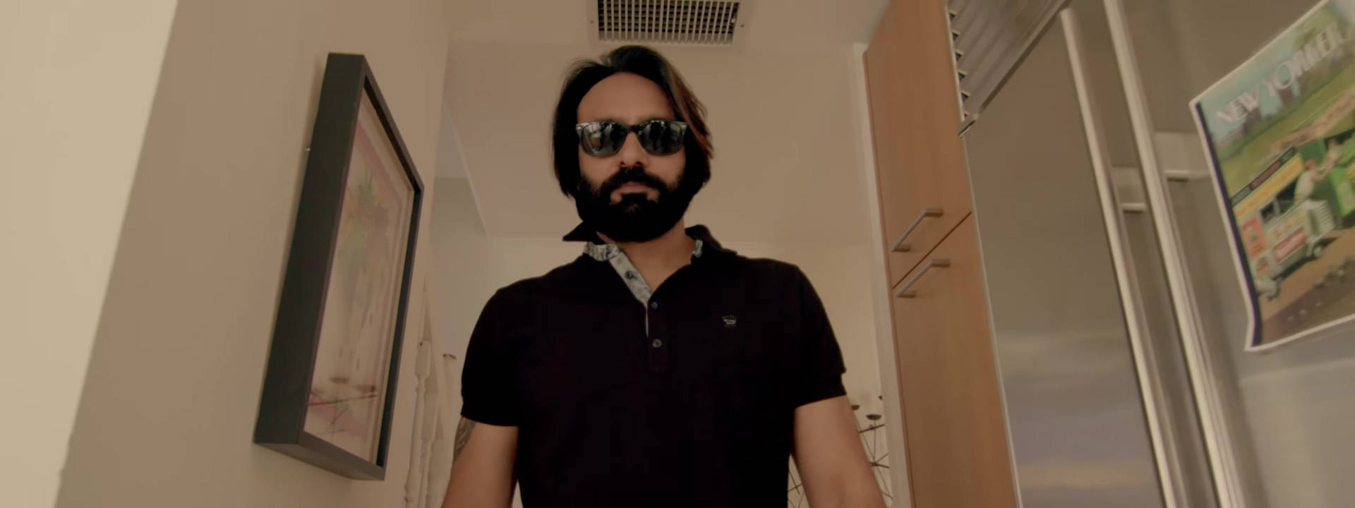 Punjabi music icon, Babbu Maan, flaunting his sunglasses Wallpaper
