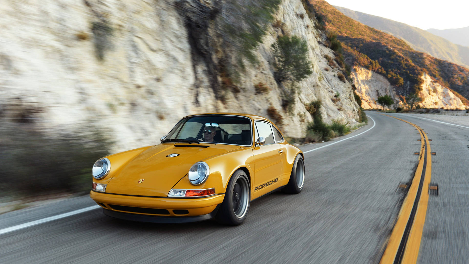 Sanger Porsche i bevægelse tapet: Udtryk din energiige selv med Porsche i bevægelse tapet. Wallpaper