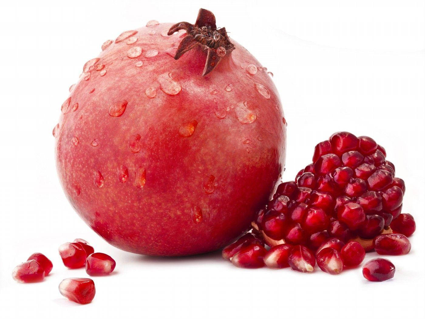 Single Pomegranate And Seeds Wallpaper