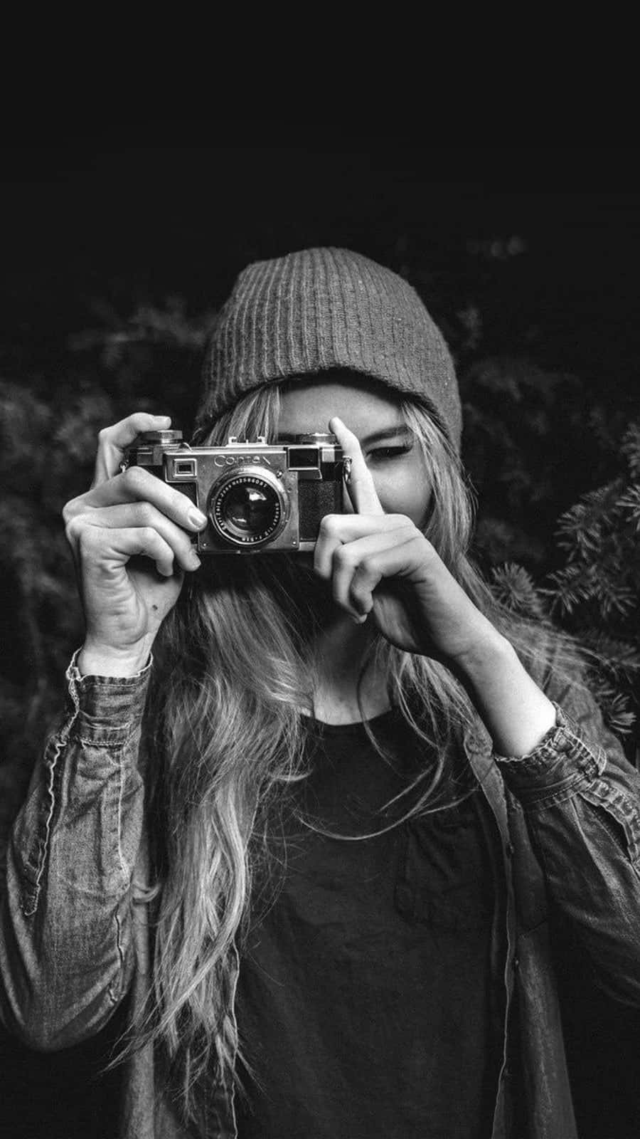 Single Woman With A Vintage Camera Wallpaper