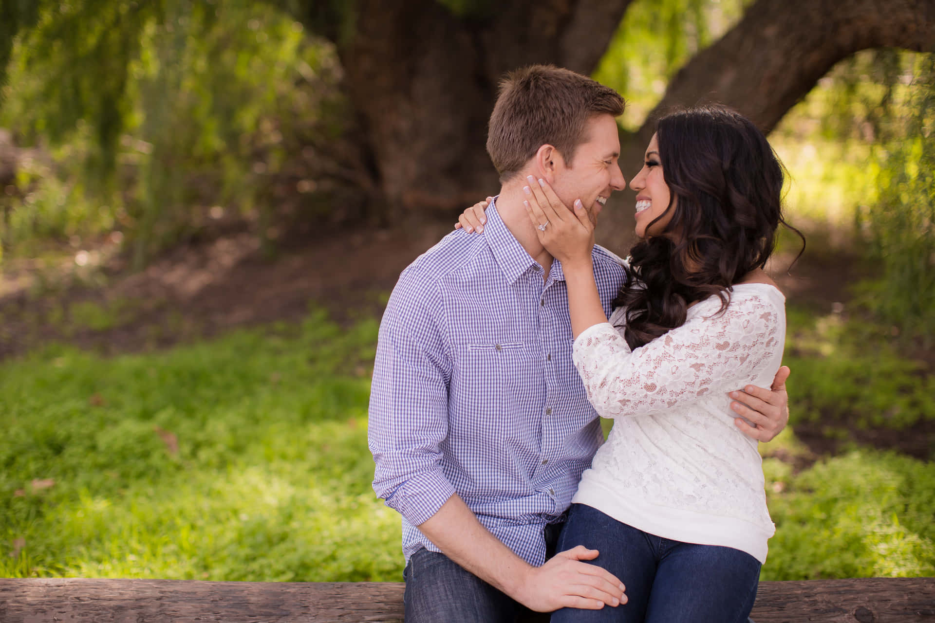 Romantic Couple Sitting Under A Tree Together | Couples, Romantic couples,  Poses