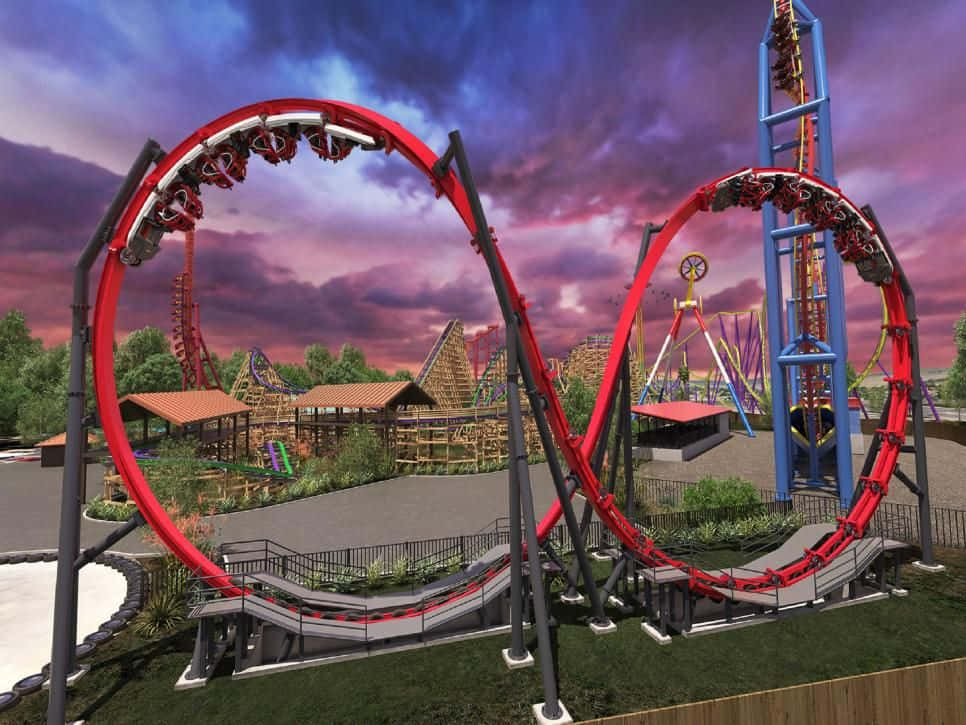 A Red Roller Coaster At An Amusement Park