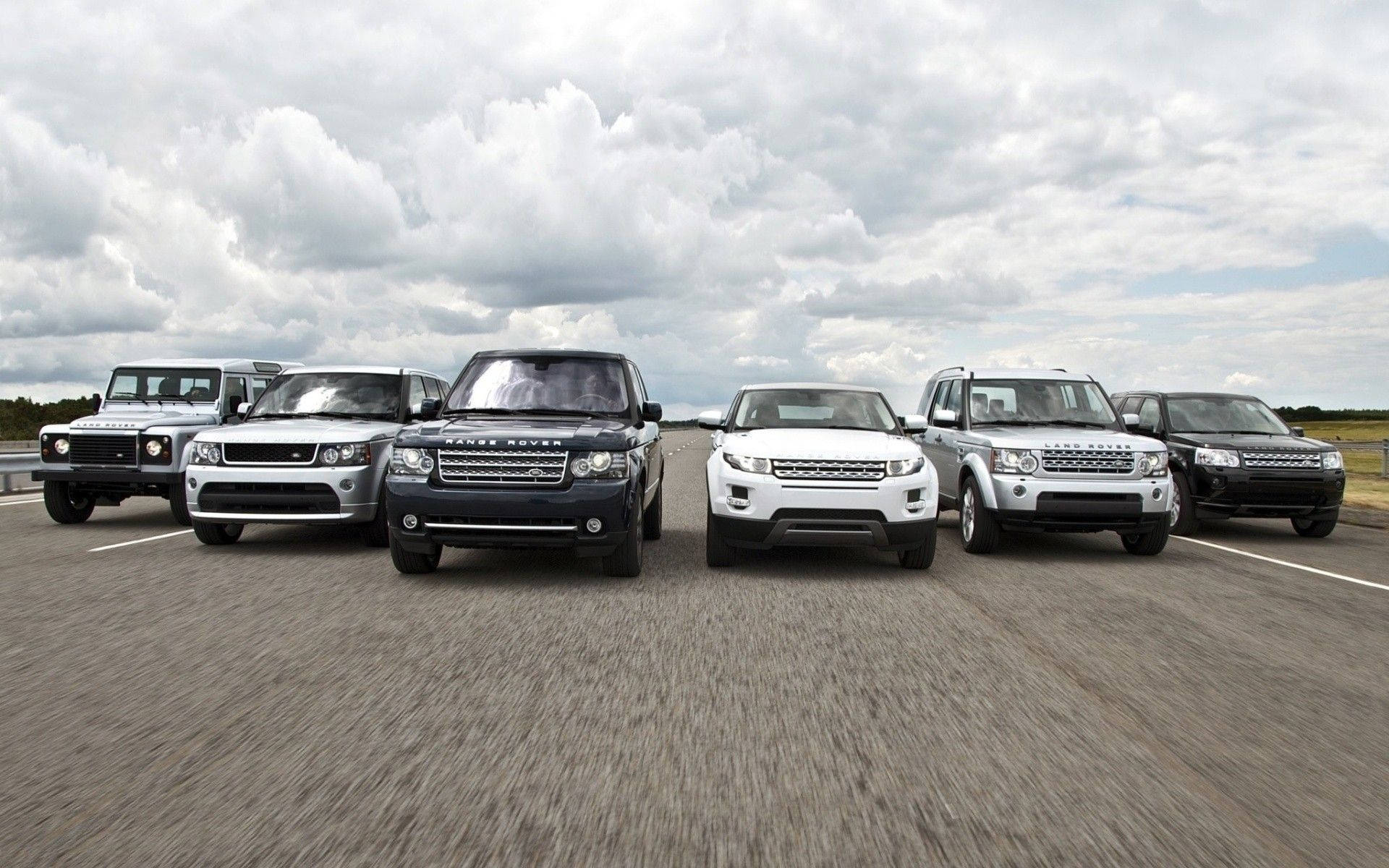 An exclusive fleet of Land Rover vehicles Wallpaper