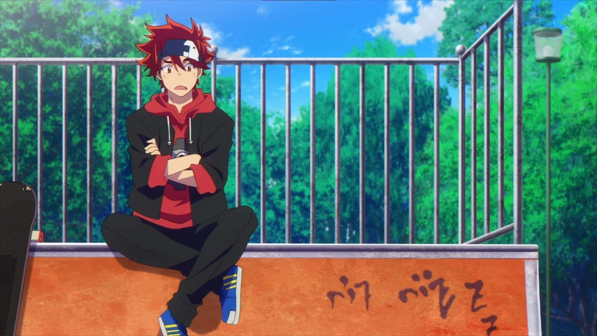 A Boy Sitting On A Ledge With A Red Hair