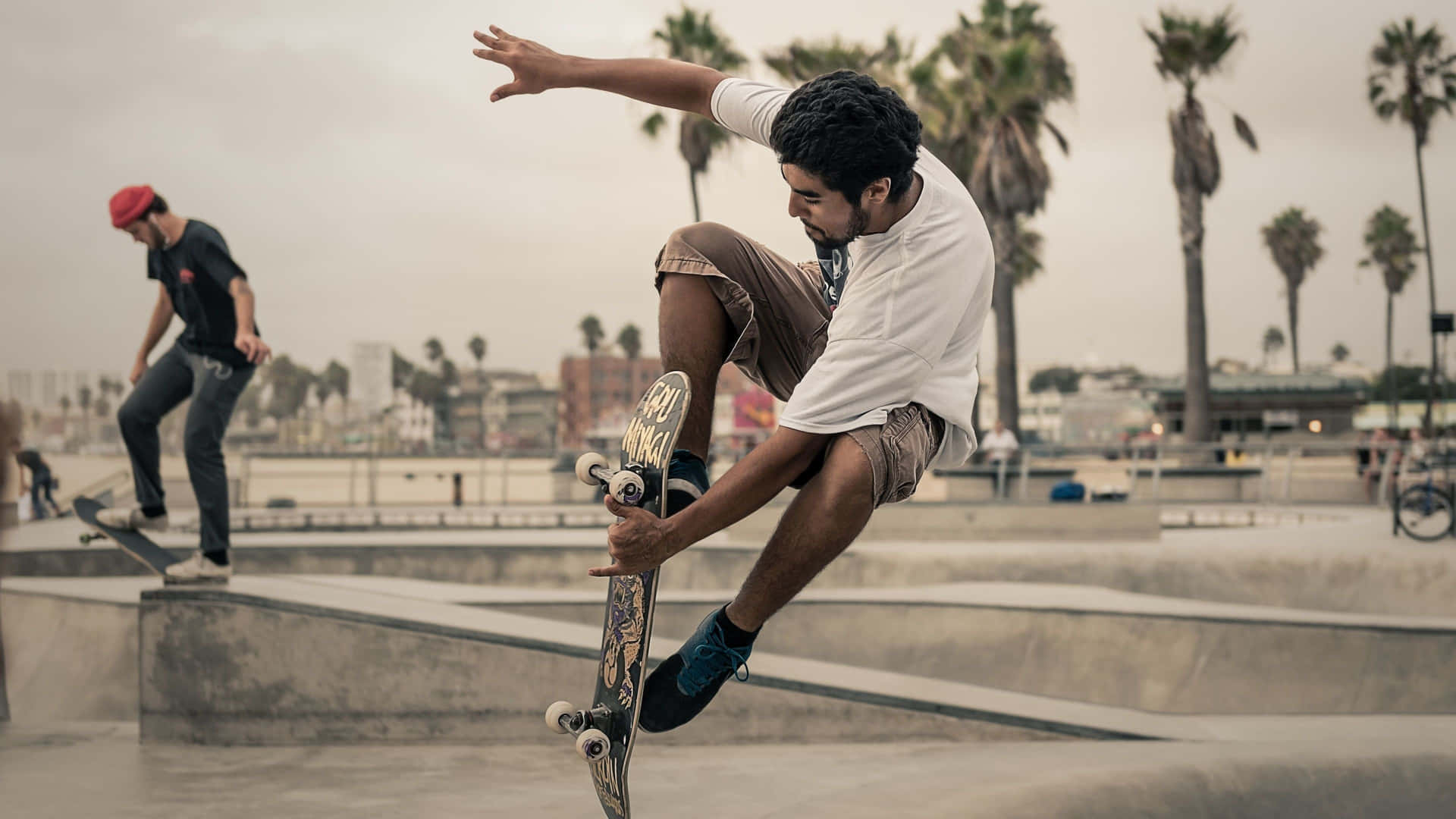 Skateboarder performing a kickflip trick