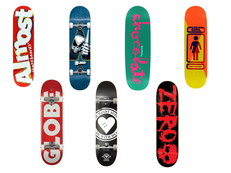 A Group Of Skateboards With Different Designs On Them Wallpaper