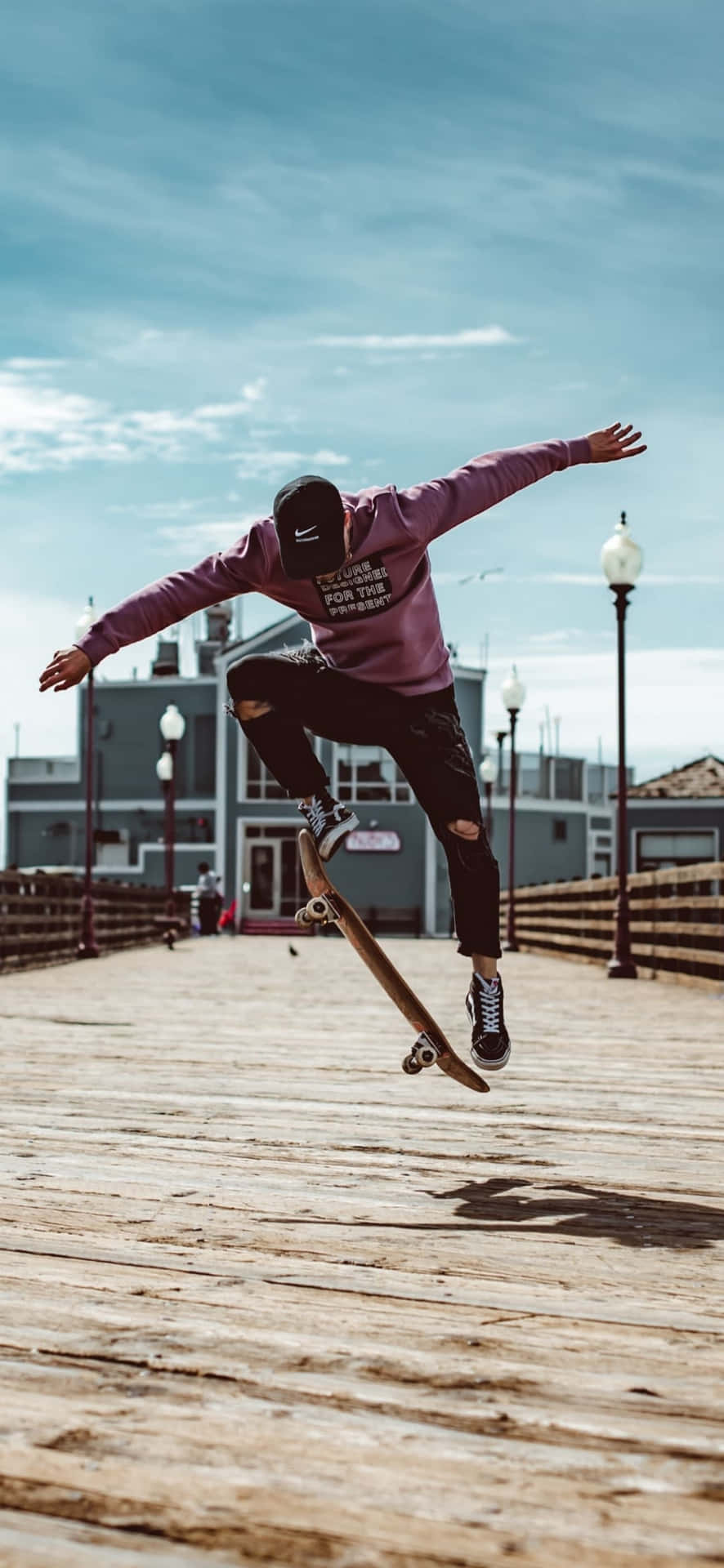 Skateboard In Motion Against A Colorful Graffiti Wall