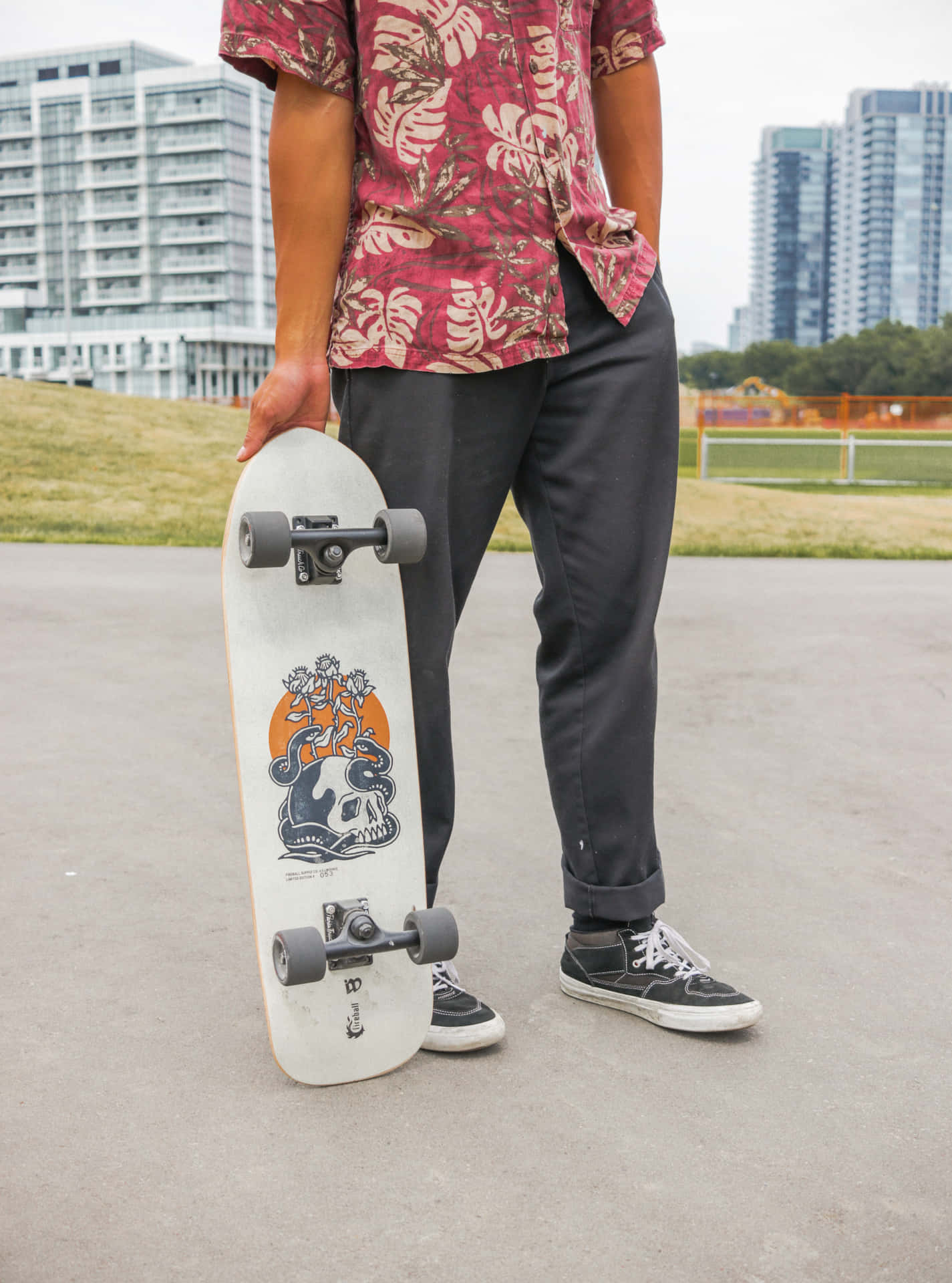 Serious Skater with his Skateboard