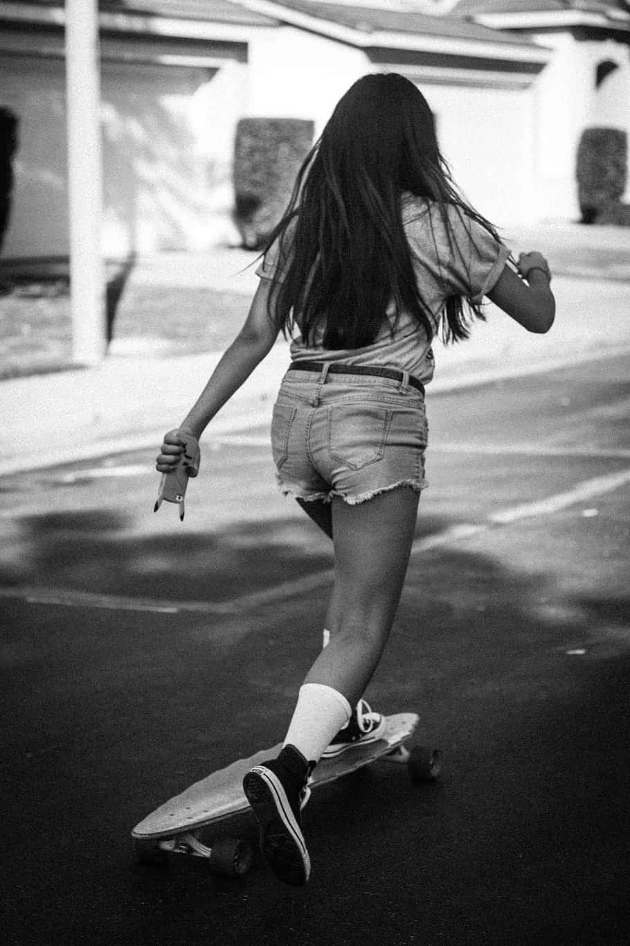 Enpige Rider På Et Skateboard.