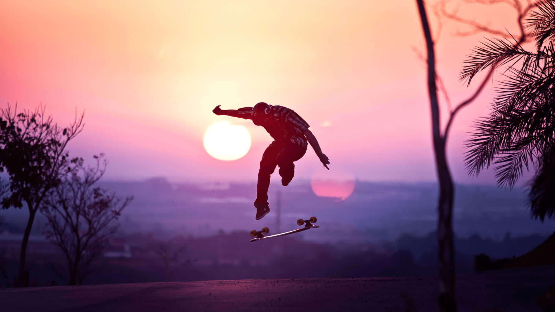 Skateboarding Sunset Silhouette Wallpaper