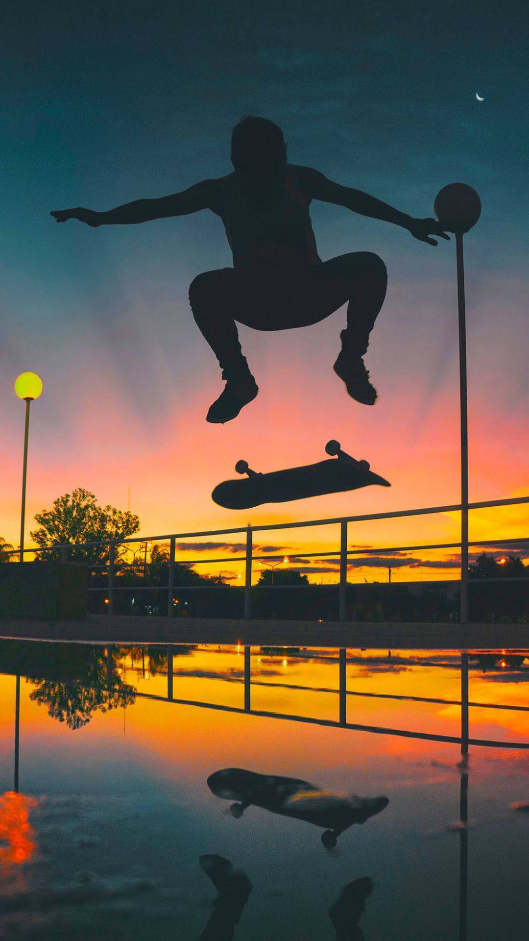 Skater Aesthetic Stunt Silhouette At Sunset Tropical Vibe Wallpaper