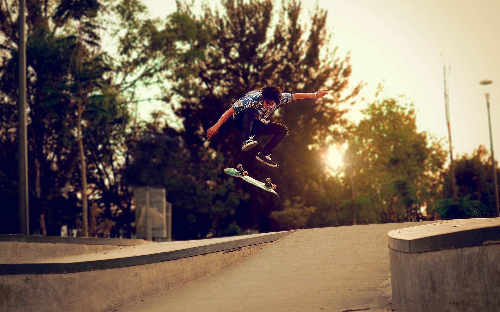 Skater Boy Nollie Trick At Sunset