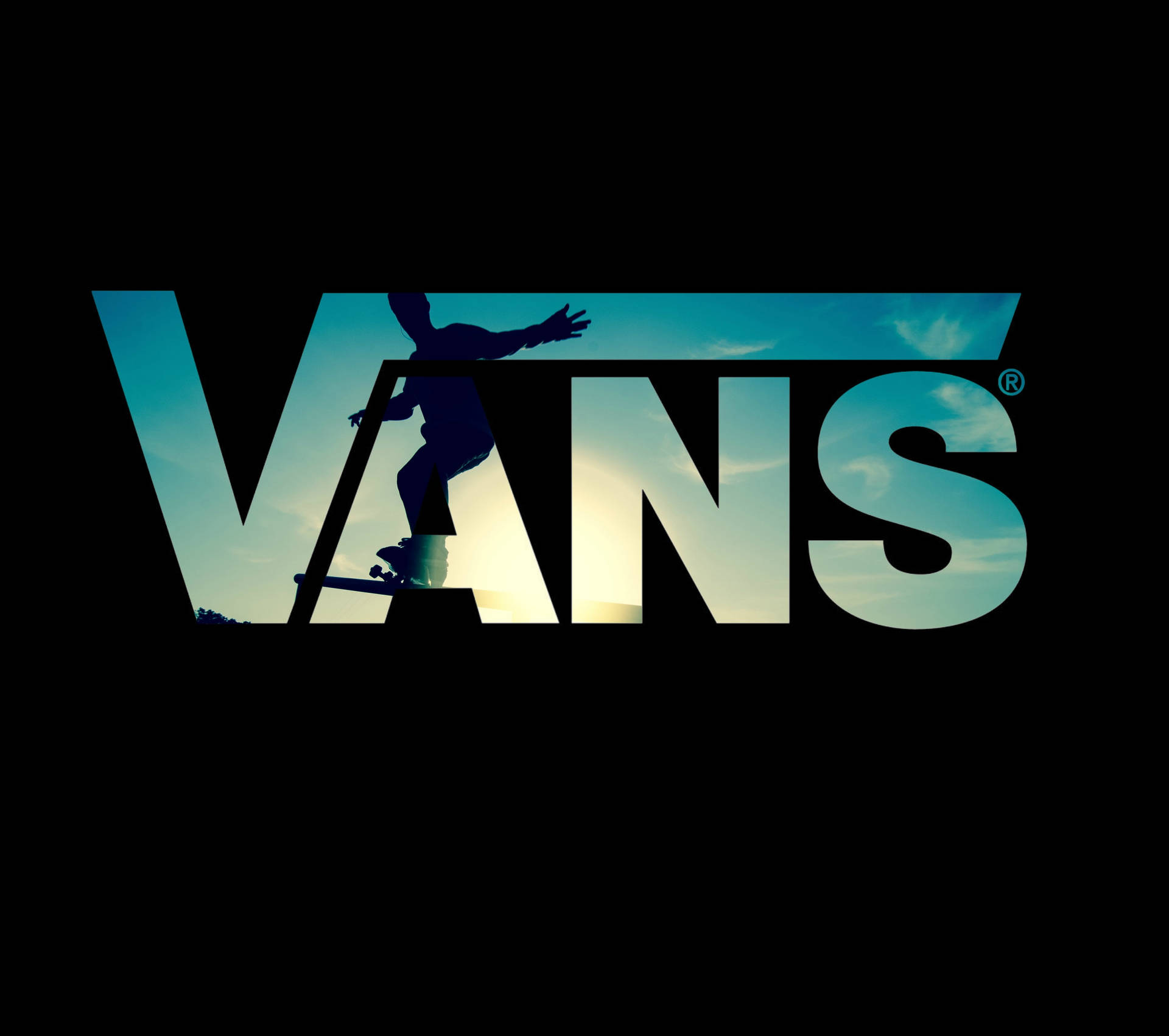 Skater Boy Vans Logo Wallpaper