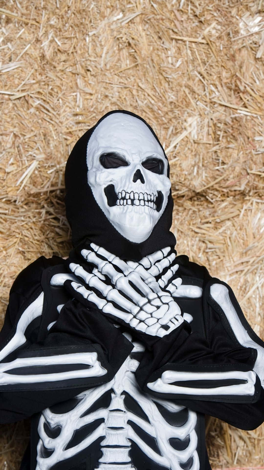 Get Ready for the Spookiest Night of the Year in a Skeleton Costume Wallpaper