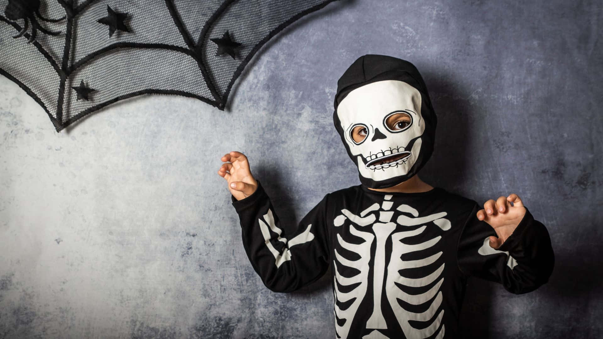 Celebrate Halloween in style with a spooky Skeleton Costume! Wallpaper
