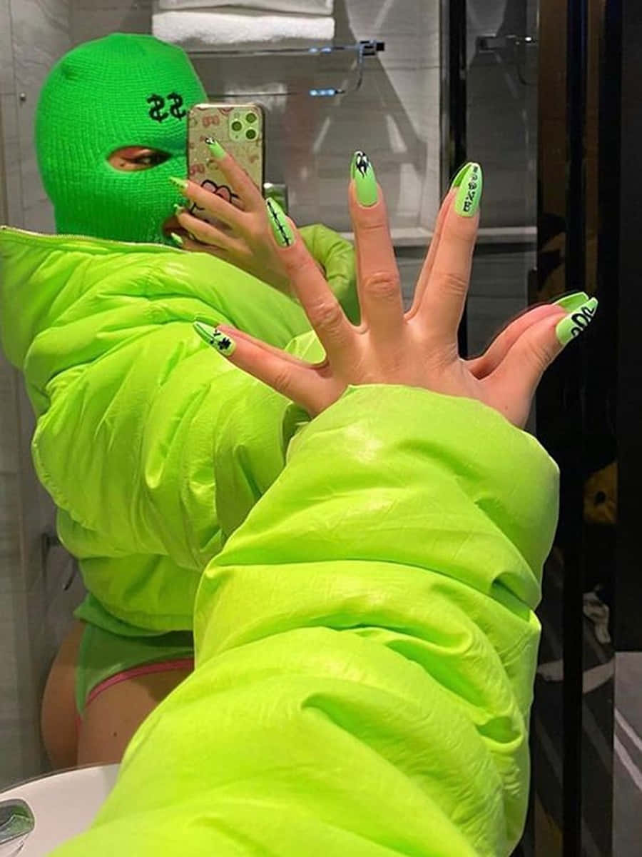 Green Ski Mask Girl In Green Jacket Wallpaper