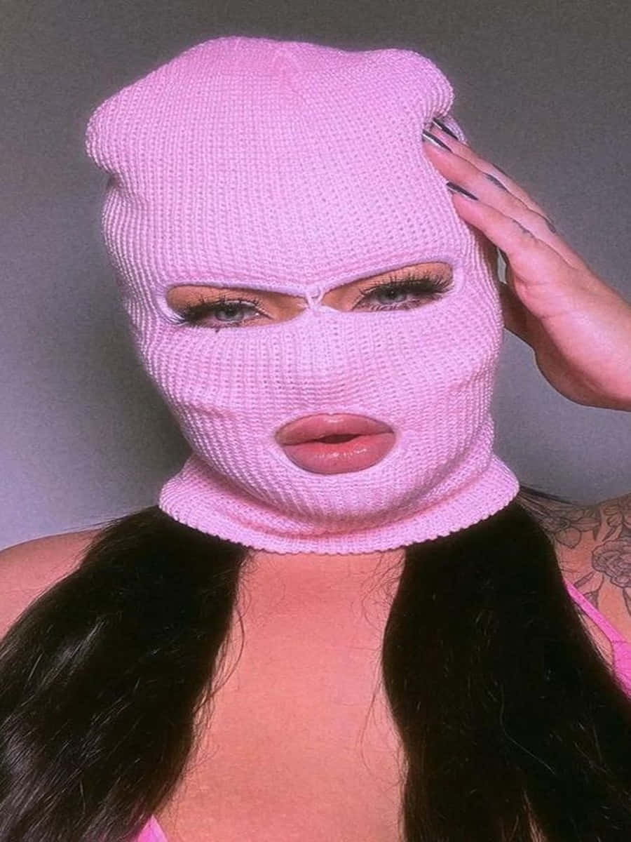 Download Long-haired Ski Mask Girl With Tattoo Wallpaper | Wallpapers.com
