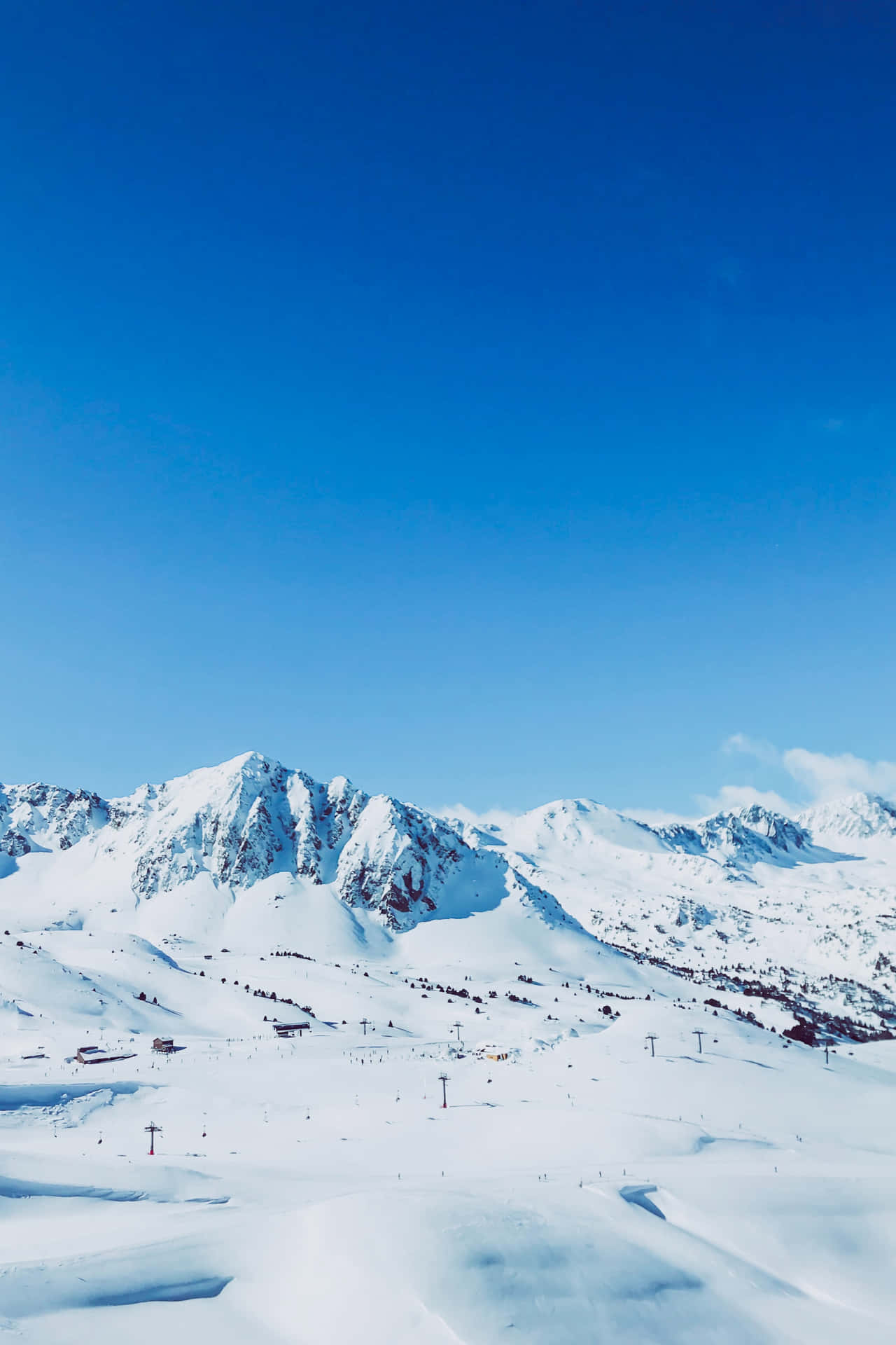 Take in the Splendid Views at a Ski Mountain Wallpaper